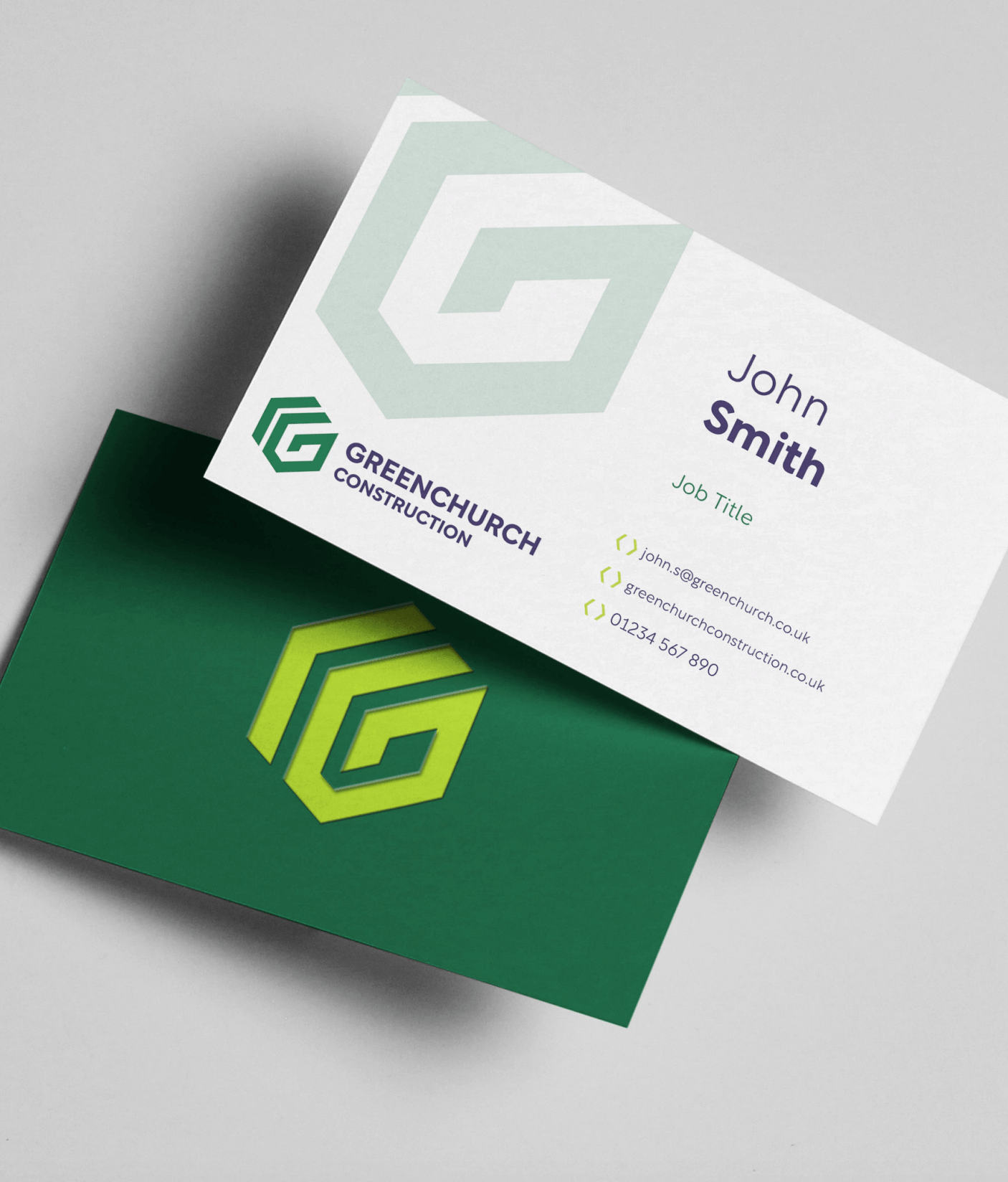 Greenchurch Construction business cards with logo and contact details for John Smith